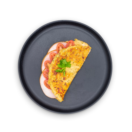 Omelette with ham and tomatoes