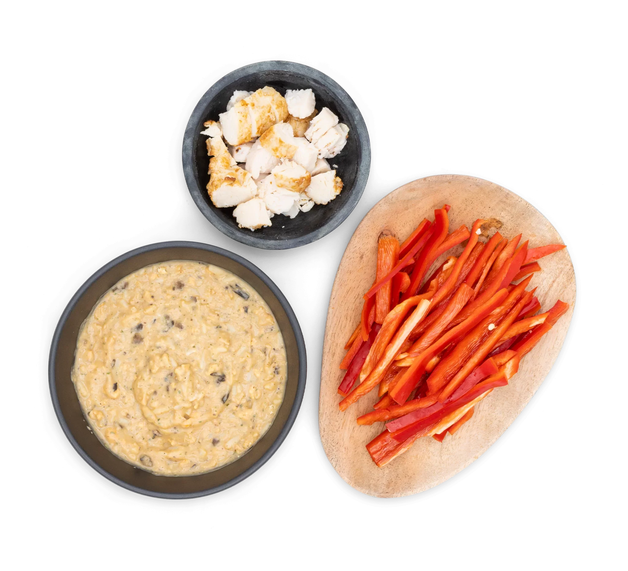 Risotto bowl with a side of bell pepper and chicken